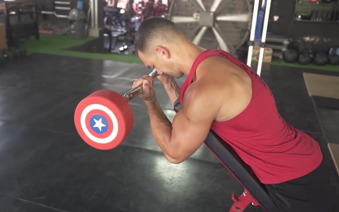 how-to-do-the-spider-curl-for-better-biceps-–-breaking-muscle