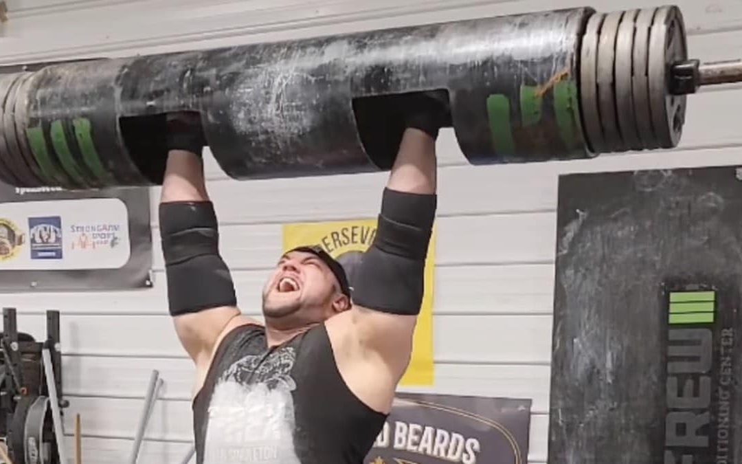 strongman-evan-singleton-log-lifts-185-kilograms-(407-pounds)-after-biceps-injury-–-breaking-muscle