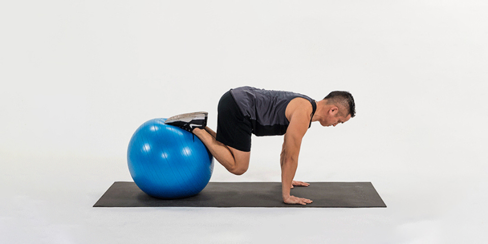 Take Your Planks to the Next Level With the Stability Ball Knee Tuck